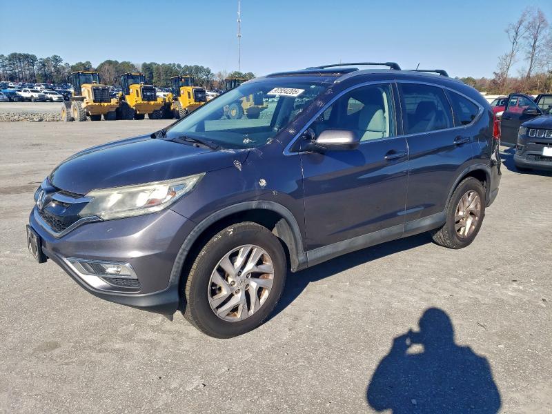 HONDA CR-V EX 2016 with VIN 2HKRM4H55GH673852 - Photo from auction