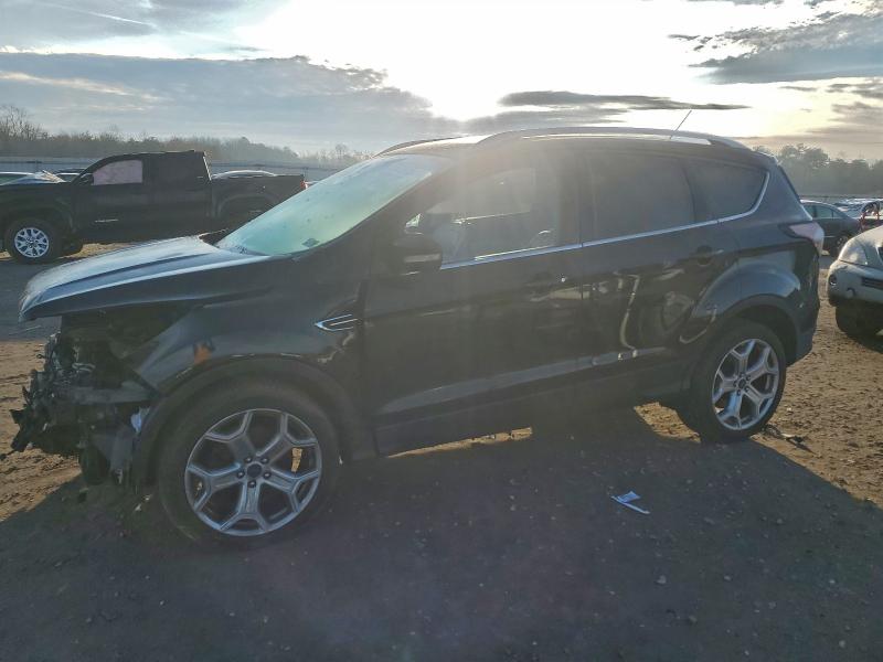 Photo 1 from auction – 2017 FORD ESCAPE TIT with VIN 1FMCU9JDXHUD68371