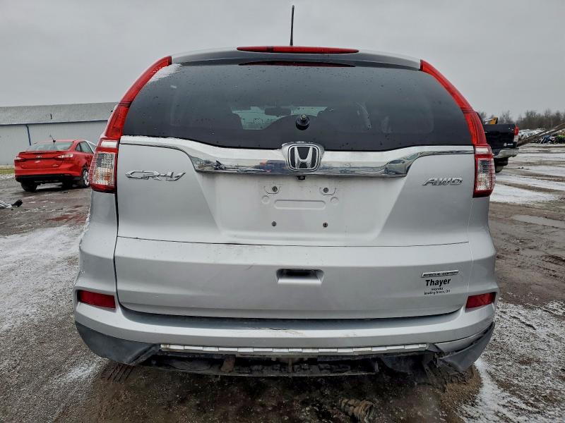 Photo 6 from auction – 2016 HONDA CR-V SE with VIN 5J6RM4H41GL035935