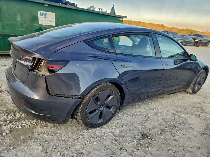 Photo 3 from auction – 2023 TESLA MODEL 3 with VIN 5YJ3E1EA3PF494355