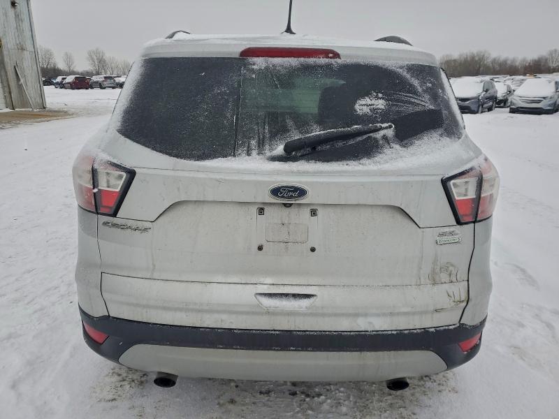 Photo 6 from auction – 2018 FORD ESCAPE SEL with VIN 1FMCU0HD4JUB10175