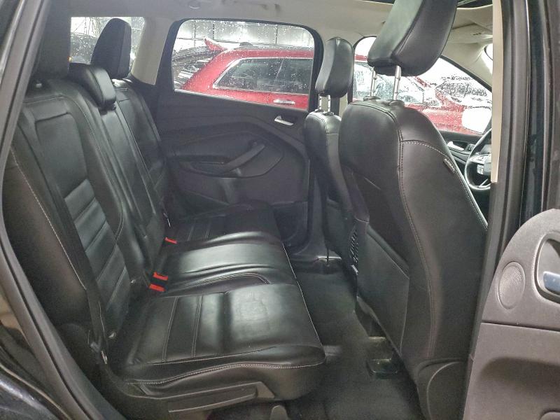 Photo 11 from auction – 2018 FORD ESCAPE TIT with VIN 1FMCU9J98JUA31134