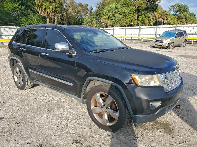 Photo 4 from auction – 2011 JEEP GRAND CHER with VIN 1J4RS6GG5BC649893