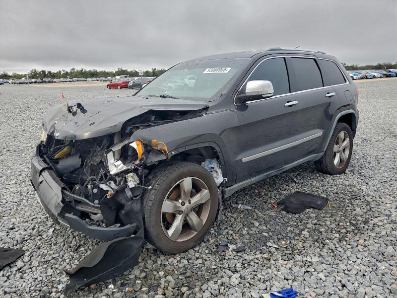 JEEP GRAND CHEROKEE 2011 with VIN 1J4RS6GG6BC659767 - Photo from auction