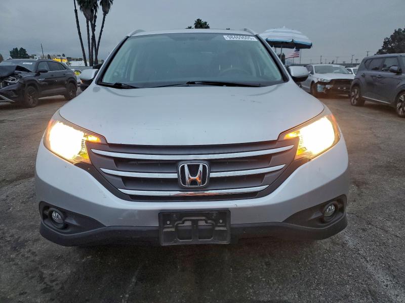 Photo 5 from auction – 2014 HONDA CR-V EXL with VIN 2HKRM3H76EH506571