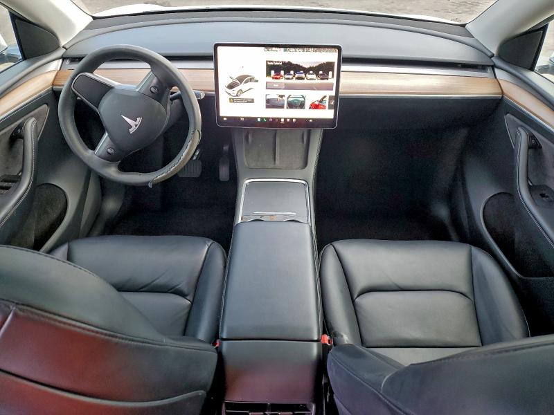 Photo 8 from auction – 2023 TESLA MODEL Y with VIN 7SAYGAEE1PF610996