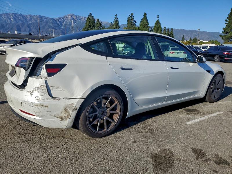 Photo 3 from auction – 2021 TESLA MODEL 3 with VIN 5YJ3E1EA5MF976207