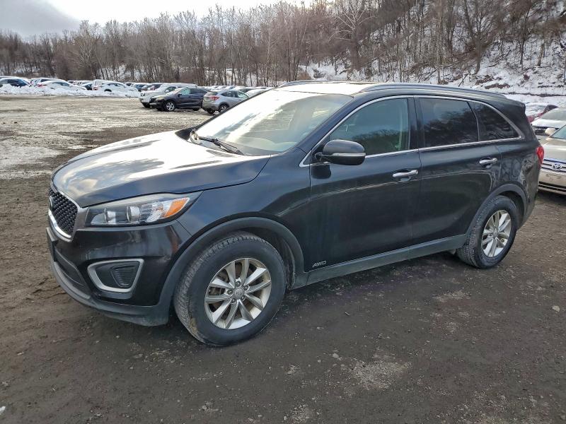 KIA SORENTO LX 2016 with VIN 5XYPGDA38GG165728 - Photo from auction