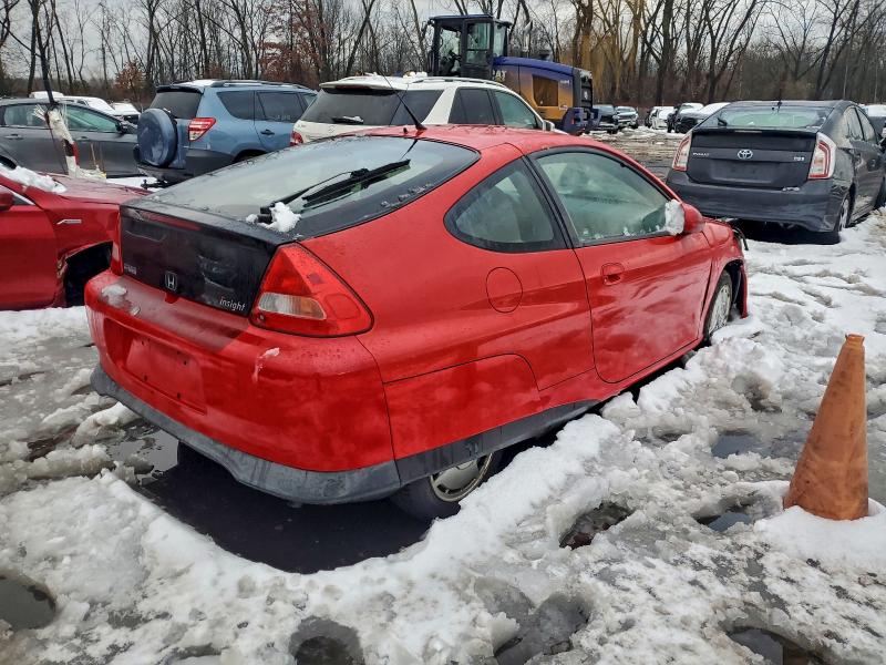 Photo 3 from auction – 2006 HONDA INSIGHT with VIN JHMZE13736S000674