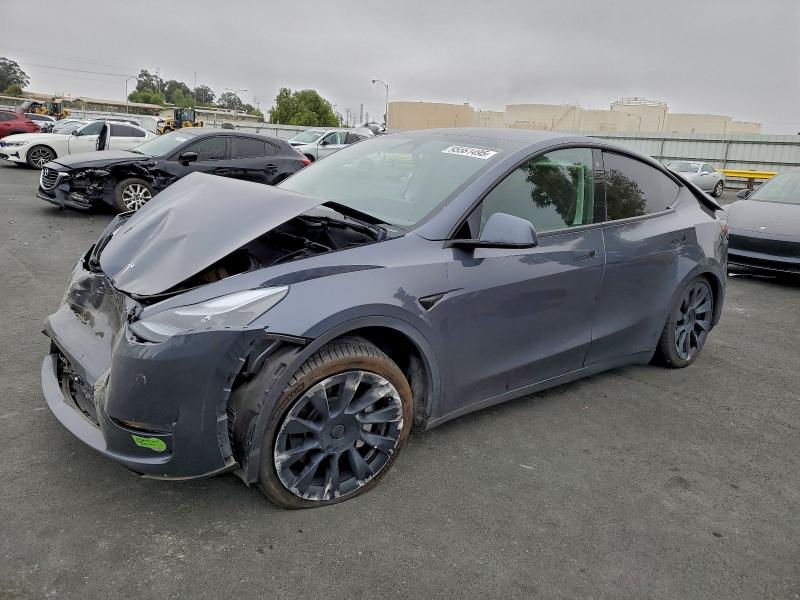 TESLA MODEL Y 2023 with VIN 7SAYGDEE2PF690360 - Photo from auction