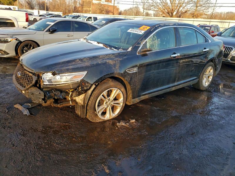 FORD TAURUS SEL 2014 с VIN 1FAHP2E80EG135914 - Фото с аукциона