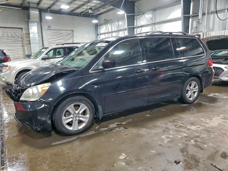 HONDA ODYSSEY TO 2010 with VIN 5FNRL3H93AB057511 - Photo from auction