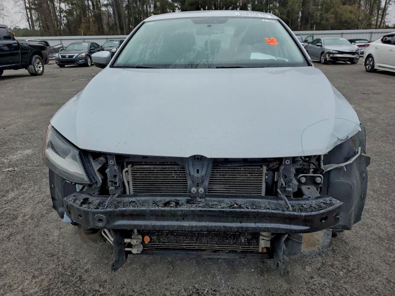 Photo 5 from auction – 2018 VOLKSWAGEN JETTA S with VIN 3VW2B7AJ1JM260857