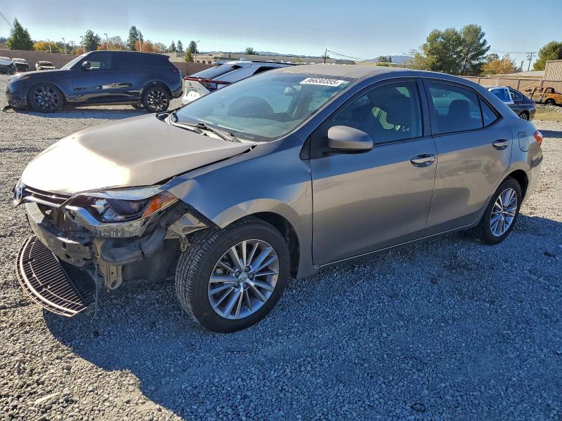 TOYOTA COROLLA L 2015 with VIN 5YFBURHE0FP305997 - Photo from auction