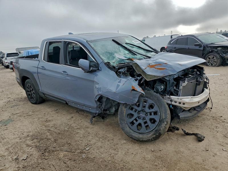 Photo 4 from auction – 2023 HONDA RIDGELINE with VIN 5FPYK3F5XPB056693