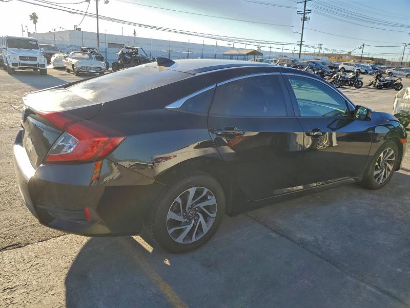 Photo 3 from auction – 2018 HONDA CIVIC EX with VIN 2HGFC2F76JH508179
