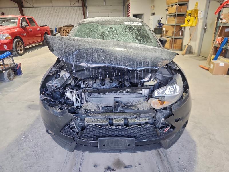 Photo 5 from auction – 2013 FORD FOCUS ST with VIN 1FADP3L94DL136411