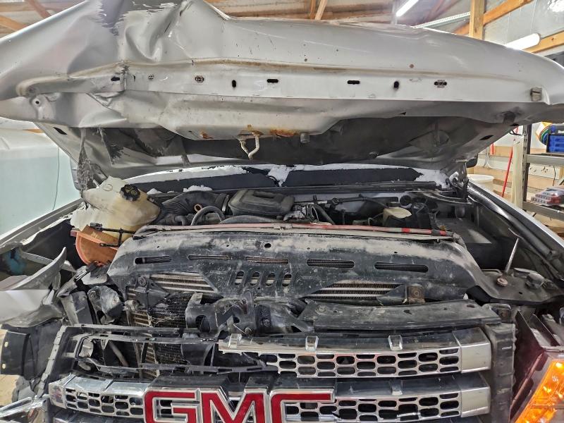 Photo 11 from auction – 2013 GMC SIERRA K25 with VIN 1GT121E8XDF128316