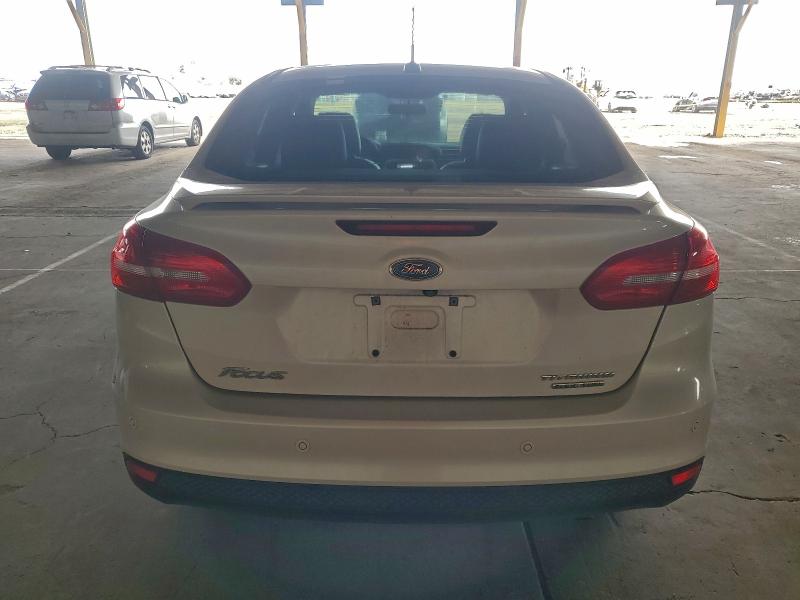 Photo 6 from auction – 2015 FORD FOCUS TITA with VIN 1FADP3J29FL248873
