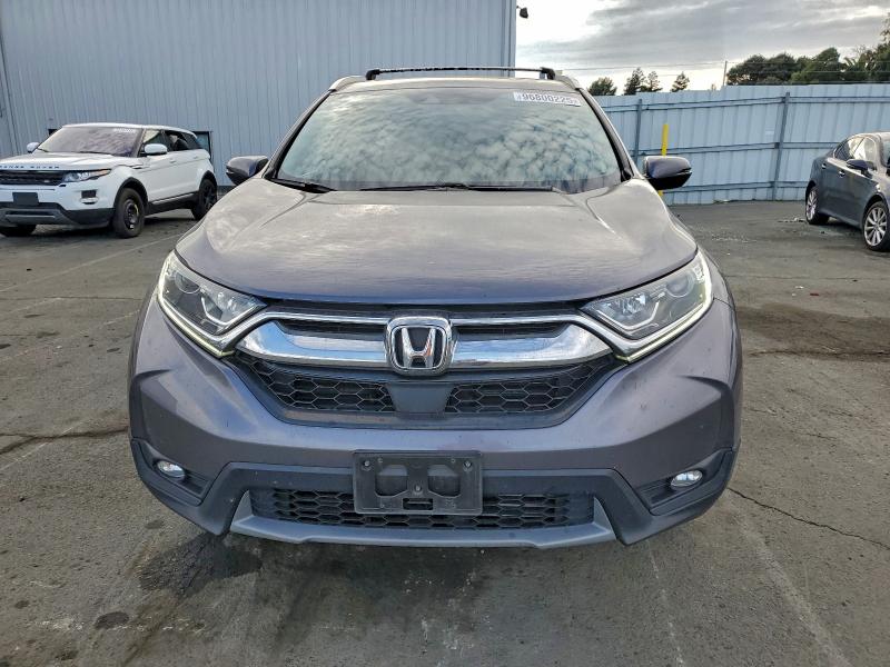 Photo 5 from auction – 2018 HONDA CR-V EX with VIN 7FARW2H50JE022136