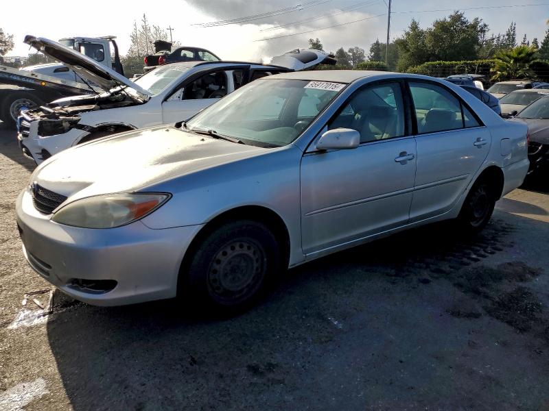 TOYOTA CAMRY LE 2004 with VIN JTDBE32K840246441 - Photo from auction