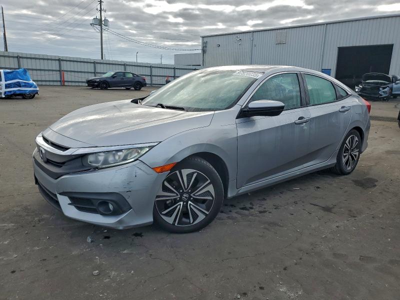HONDA CIVIC EXL 2017 with VIN 19XFC1F79HE029575 - Photo from auction