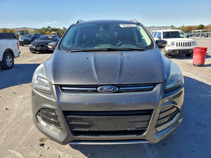 Photo 5 from auction – 2015 FORD ESCAPE TIT with VIN 1FMCU0JX3FUC59950