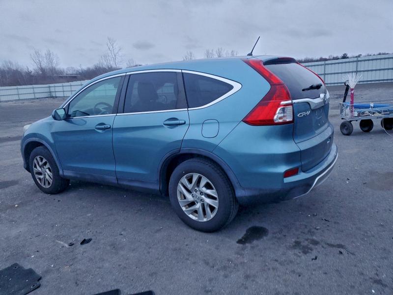 Photo 2 from auction – 2016 HONDA CR-V with VIN 5J6RM4H53GL022984