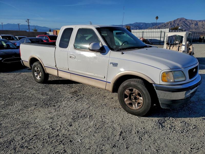 Photo 4 from auction – 1998 FORD F150 with VIN 1FTRX17L6WNA88069
