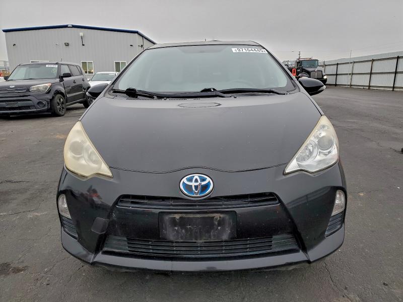 Photo 5 from auction – 2014 TOYOTA PRIUS C with VIN JTDKDTB3XE1066286