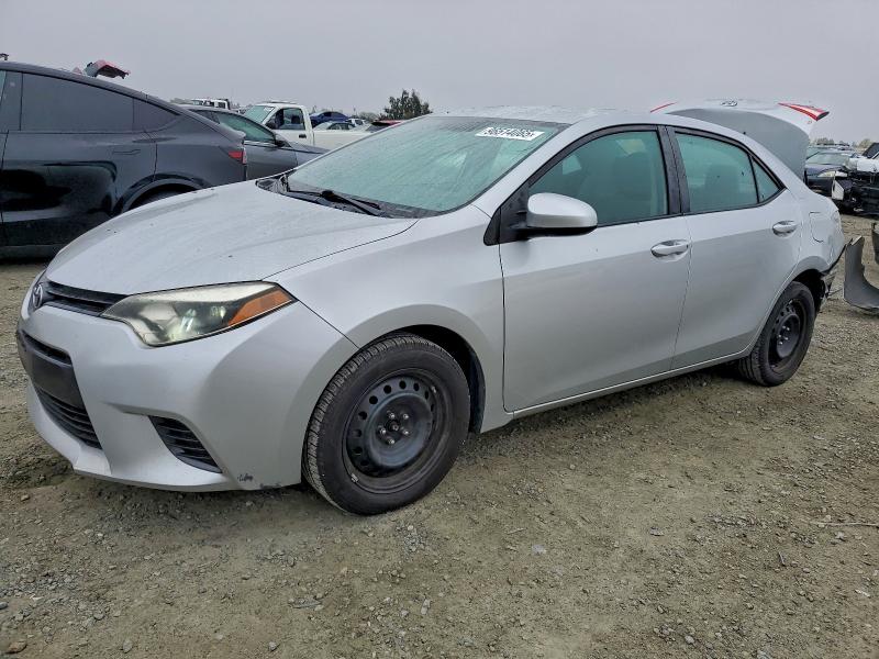 TOYOTA COROLLA L 2016 con VIN 5YFBURHE6GP486010 - Foto de la subasta