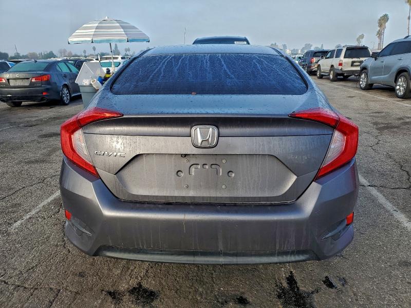 Photo 6 from auction – 2017 HONDA CIVIC LX with VIN 2HGFC2F59HH521257
