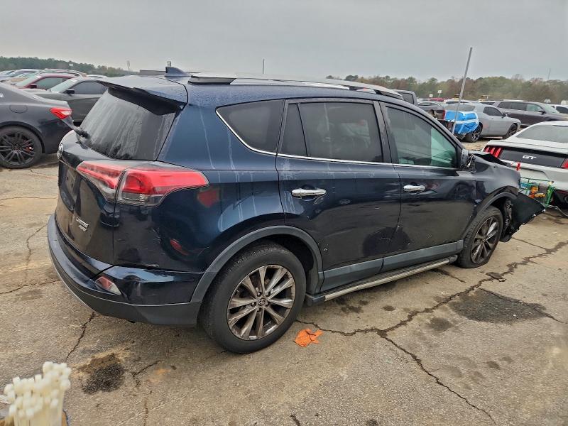 Photo 3 from auction – 2017 TOYOTA RAV4 LIMIT with VIN 2T3DFREV5HW587926