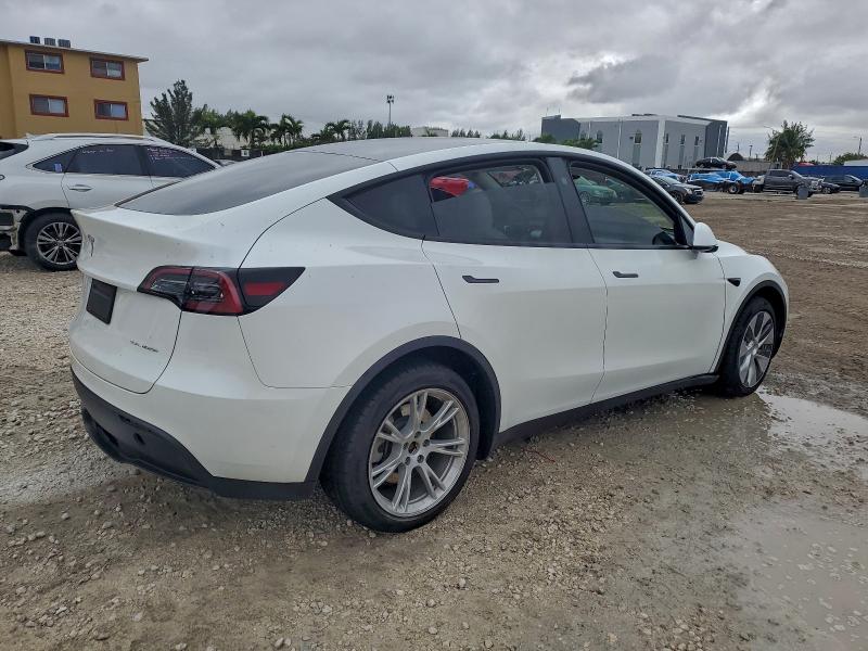 Photo 3 from auction – 2023 TESLA MODEL Y with VIN 7SAYGAEE4PF898450
