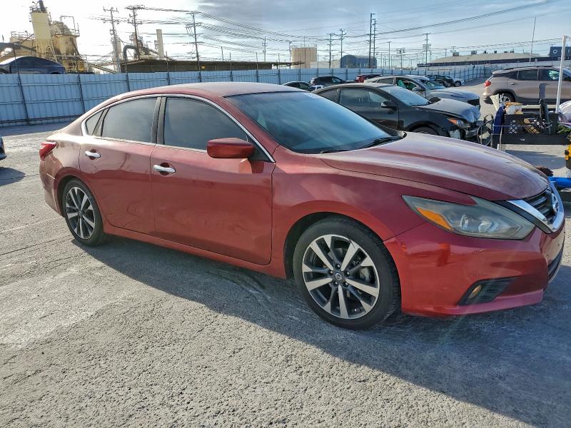 Photo 4 from auction – 2016 NISSAN ALTIMA 2.5 with VIN 1N4AL3AP0GC224876