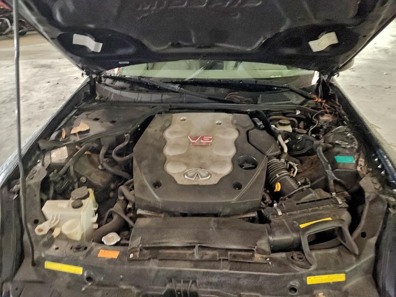 Photo 11 from auction – 2004 INFINITI G35 with VIN JNKCV54E34M801052