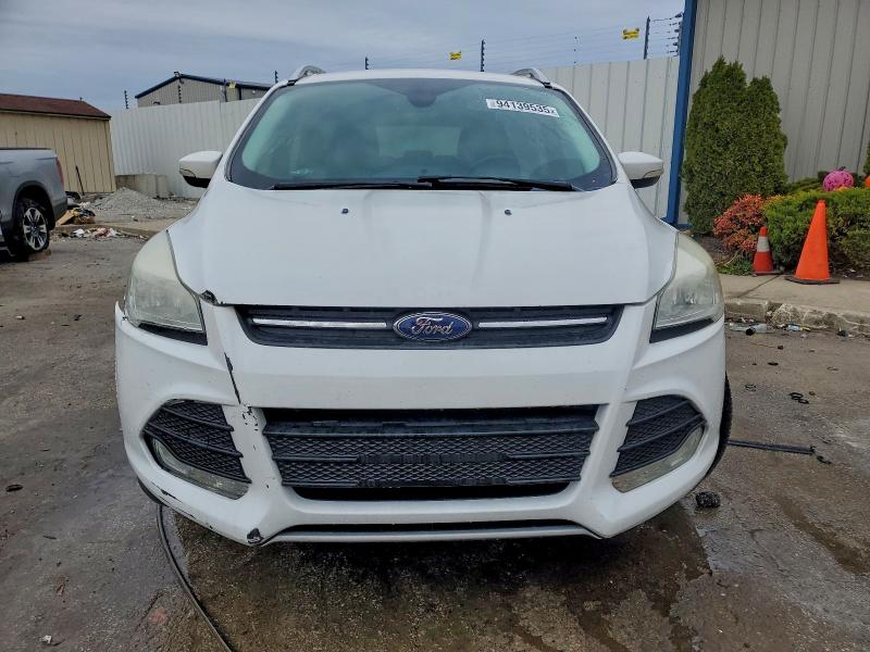 Photo 5 from auction – 2015 FORD ESCAPE TIT with VIN 1FMCU0J98FUC24614