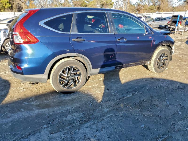 Photo 3 from auction – 2016 HONDA CR-V SE with VIN 2HKRM4H48GH667390