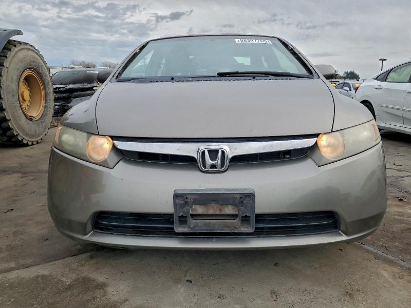 Photo 5 from auction – 2006 HONDA CIVIC LX with VIN JHMFA16586S006737
