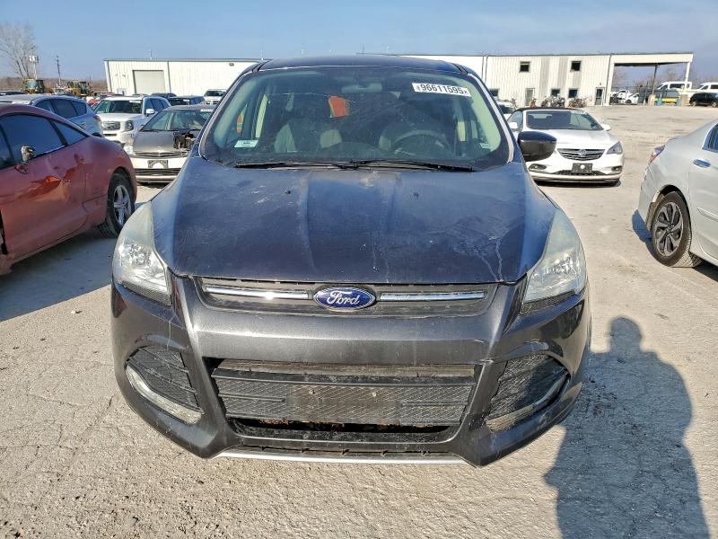Photo 5 from auction – 2015 FORD ESCAPE SE with VIN 1FMCU9G98FUA43203