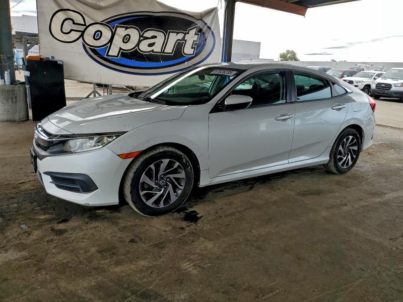 HONDA CIVIC EX 2016 with VIN 19XFC2F72GE246034 - Photo from auction