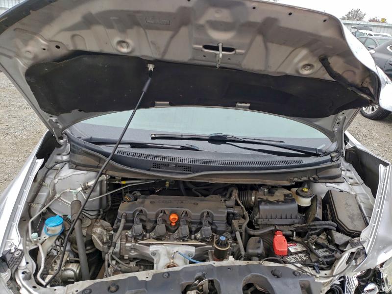 Photo 11 from auction – 2014 HONDA CIVIC LX with VIN 19XFB2F57EE273244