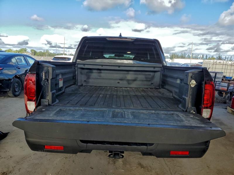 Фото 6 с аукциона – 2018 HONDA RIDGELINE с VIN 5FPYK2F60JB002300