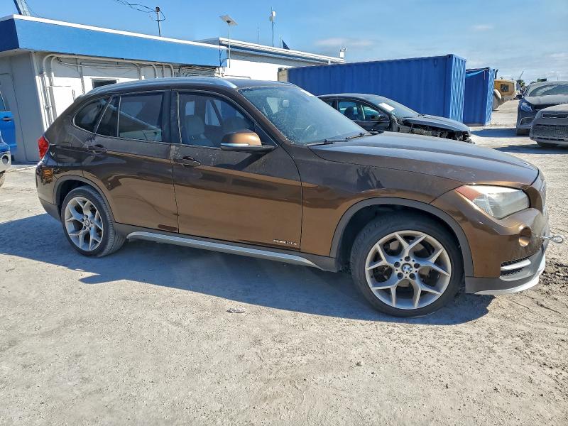 Photo 4 from auction – 2015 BMW X1 SDRIVE2 with VIN WBAVM1C59FV319364