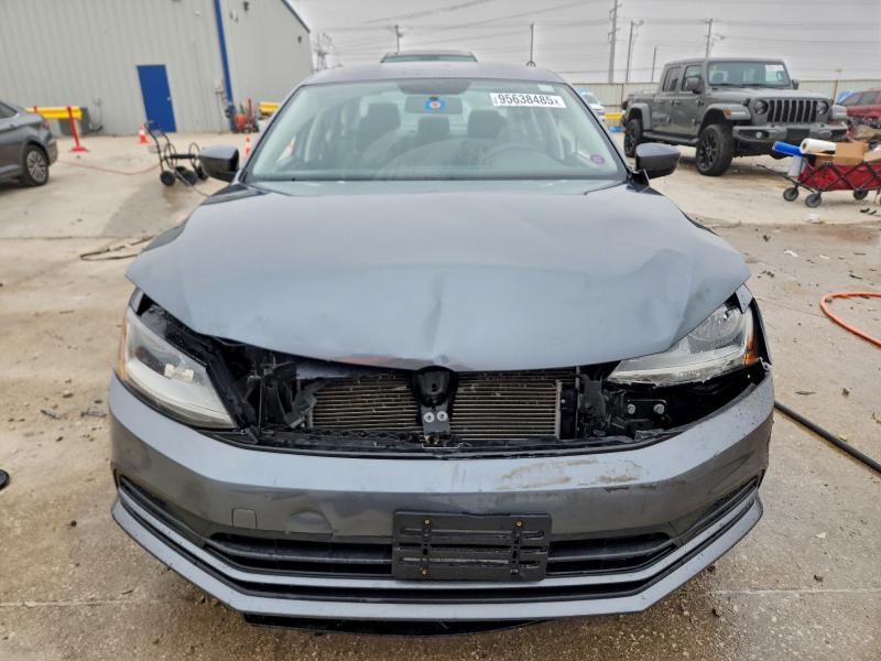 Photo 5 from auction – 2017 VOLKSWAGEN JETTA S with VIN 3VW2B7AJ2HM384114