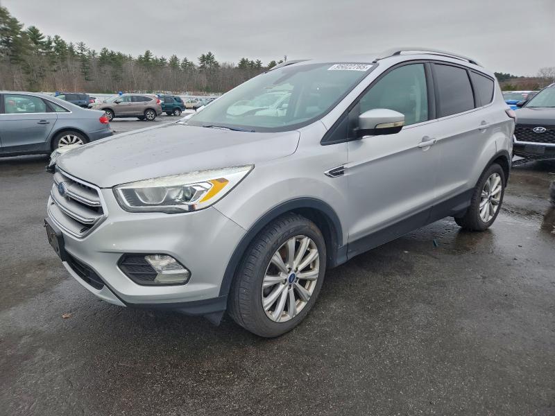FORD ESCAPE TIT 2017 with VIN 1FMCU9J92HUC56336 - Photo from auction