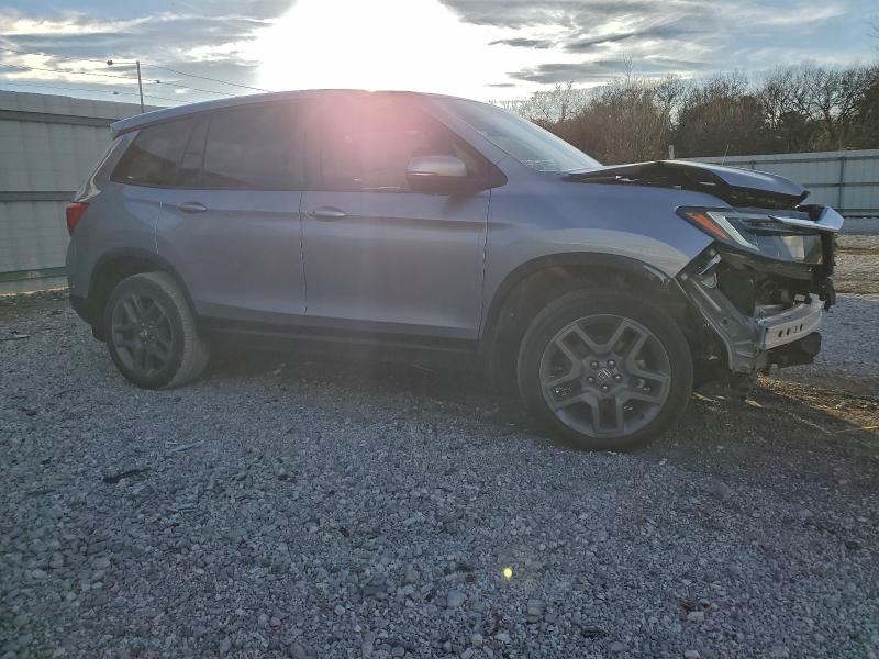 Photo 4 from auction – 2022 HONDA PASSPORT E with VIN 5FNYF8H53NB022406
