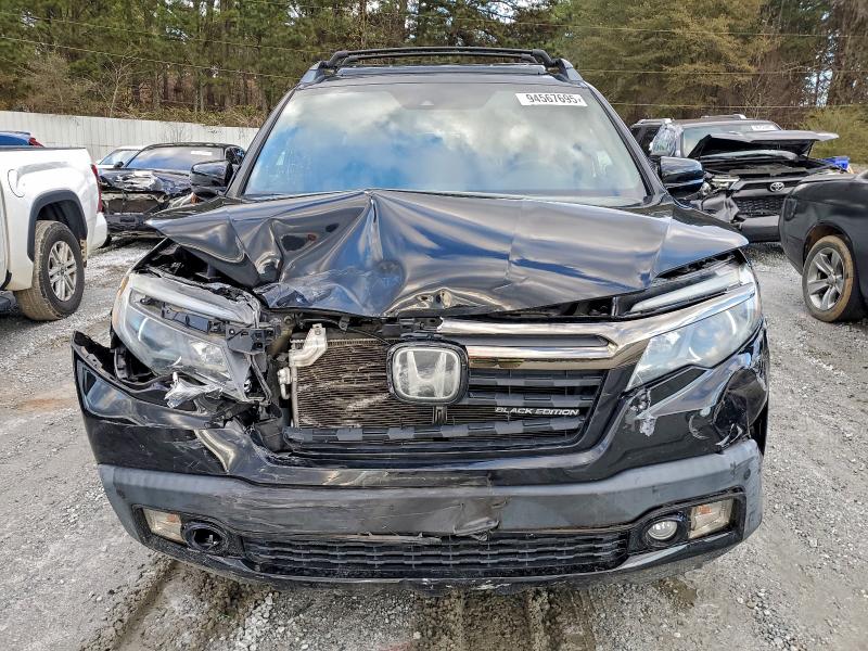 Photo 5 from auction – 2019 HONDA RIDGELINE with VIN 5FPYK3F80KB018828