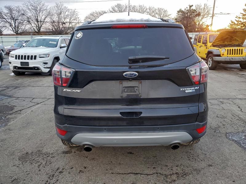 Photo 6 from auction – 2017 FORD ESCAPE TIT with VIN 1FMCU9J96HUB14006