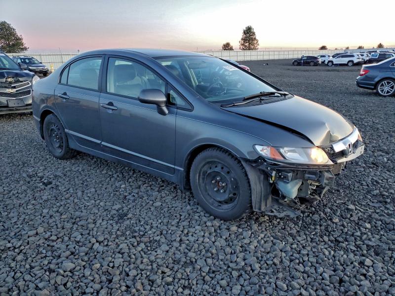 Photo 4 from auction – 2011 HONDA CIVIC LX with VIN 19XFA1F56BE008775